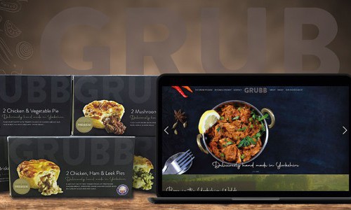 GRUBB packaging and website on laptop screen